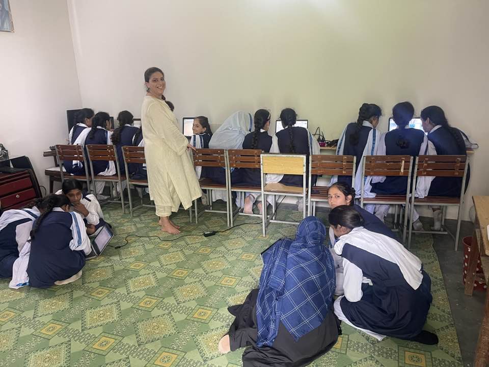 Girls learning computers at Bradrie